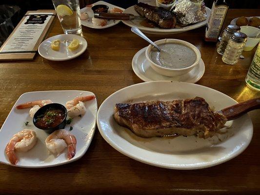 KC strip, salad, fries and gravy with shrimp cocktail for $36.