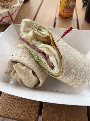 Healthy wrap with turkey bacon, avocado, egg