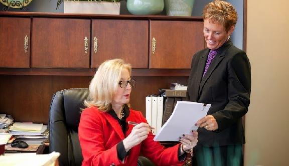 Linda working with her Legal Assistant Naomi