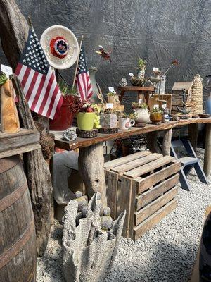 Outdoor eating area has items for sale