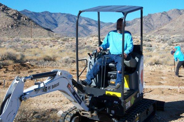 Rocks.....Havasu Solar got the equipment to dig the foundations for the panels when a post hole digger wouldn't work!