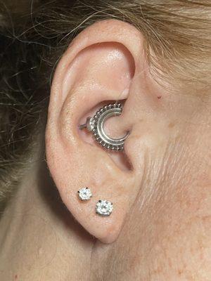 Had daith changed & conch pierced by Lexi.