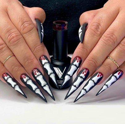 Make your nails come to life with this Halloween-inspired design.