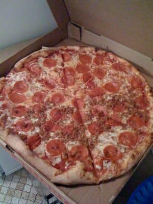 Half pepperoni, half pepperoni and sausage.