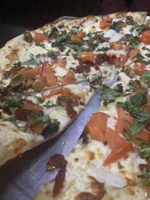 Sun dried tomato pizza