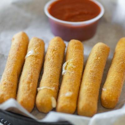 Our homemade cheese sticks, with a side of Side of Scorno's Pasta Sauce.