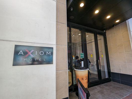 Outside. Storefront. Powell Street entrance. Located inside the Axiom Hotel.