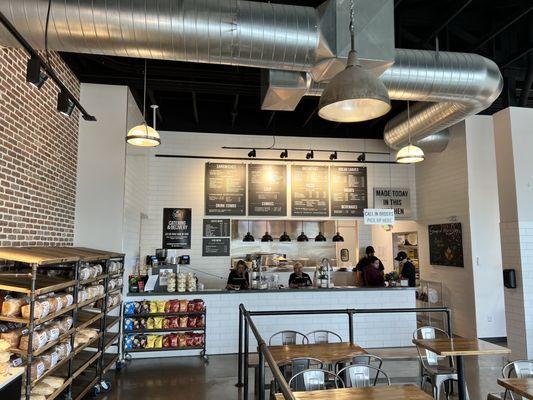 Staff at the front counter, and the main menu above.