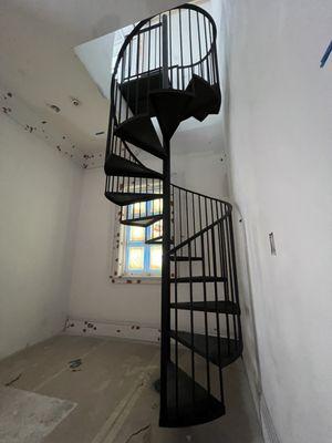 spiral staircase with metal railings safest and most secure