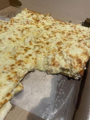 Needed y'all to see the inside of this beauty . Chicken Alfredo pizza .