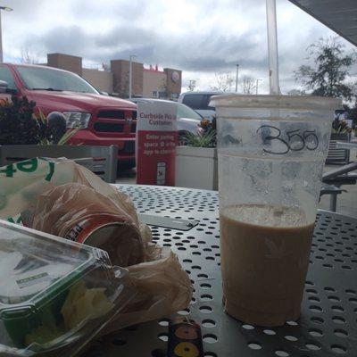 Sitting outside Wawa with my coffee and sushi!