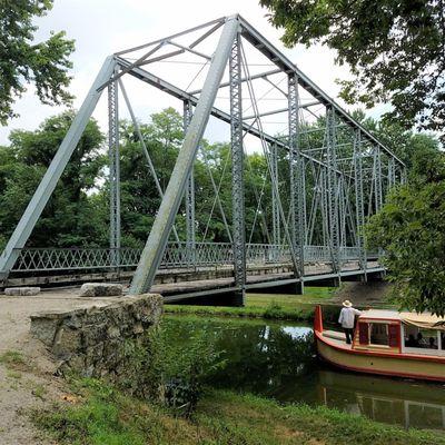 canal boat and historic bridge