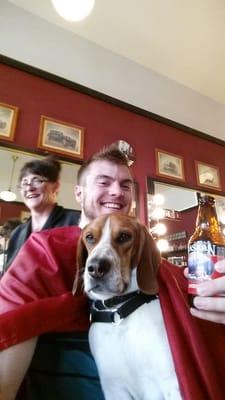 Sat down for my haircut, got handed a beer and the had a pup jump up on my lap. Best haircut I've gotten in my life. 10/10