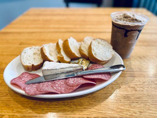 Baguette plate with salami and Brie, Kona blended coffee with espresso shot