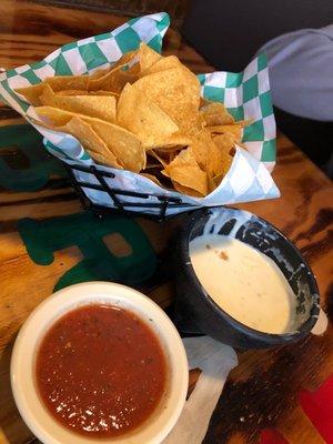 Queso with a bit of Poblano. Delicious