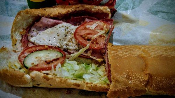 Ft lng. italian bmt white bread, provolone cheese, oregano,. toasted. lettuce tomato black pepper, vinegar and oil. yummy