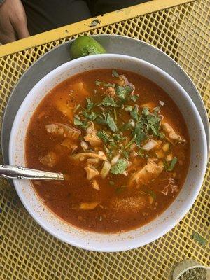 Menudo served with freshly made tortillas (not shown)