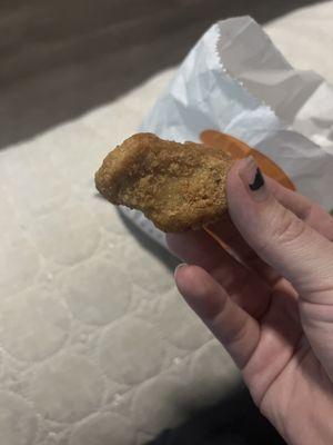 old shriveled chicken nugget