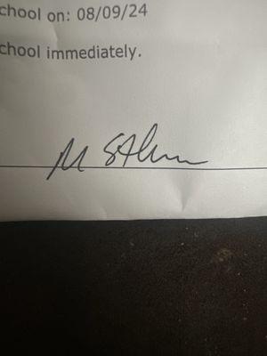 The signature of the provider who screamed at me, making my son cry.