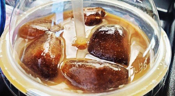 Ice coffee with oat milk and coffee cubes