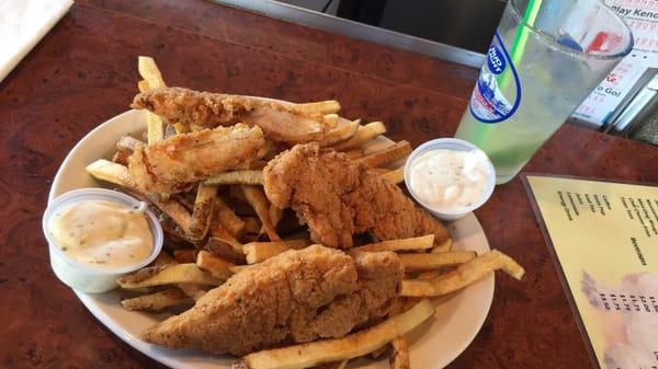 A Margarita and chicken strips w/ fries