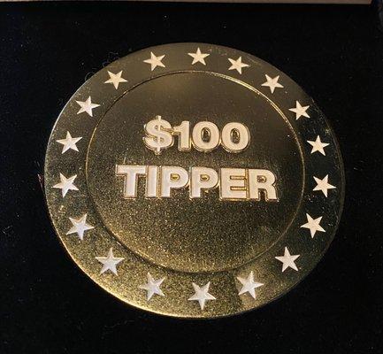 The specially produced and signed $100 Tipper Coin from our partnership with Jeniffer Rubell for the $100 Tipper Coin event!