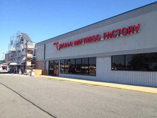 Renovations to facade and new tenant National Optometry.