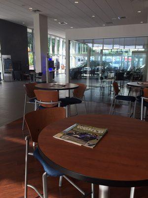 Waiting area with snacks, fruit, cold beverages and Starbuck's coffee.