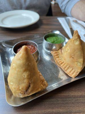 Samosas with amazing homemade sauces.