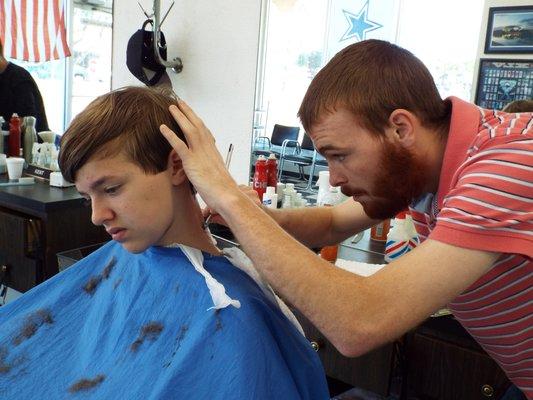 Tommy getting his ears lowered.