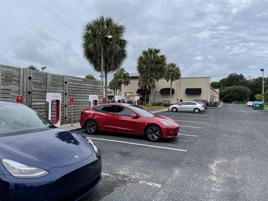 Firehouse Subs at the end of charging parking lot.