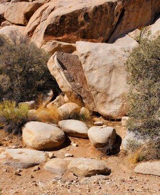 This split rock was used for multiple purposes there are holes above that the woman would use to grind things.