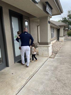 Dad and the kids excited for their appointment! Walking into the office!