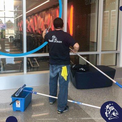 Washing windows at commercial client