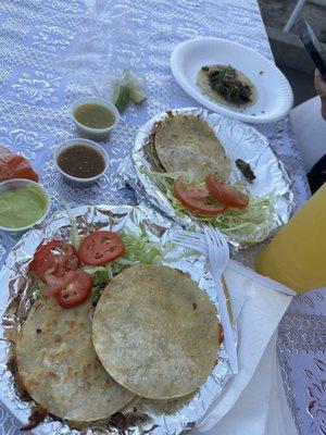 Asada and carnita mulitas with a taco de cabeza