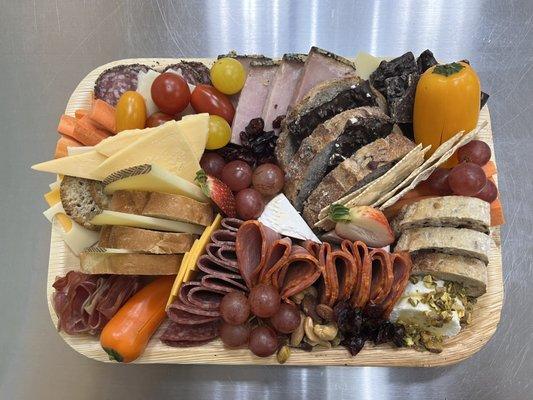 Gone Grazey Classic Picnic board with add-ons. We can beef up any order to your liking! Classic Picnic board is $65 before add-ons.