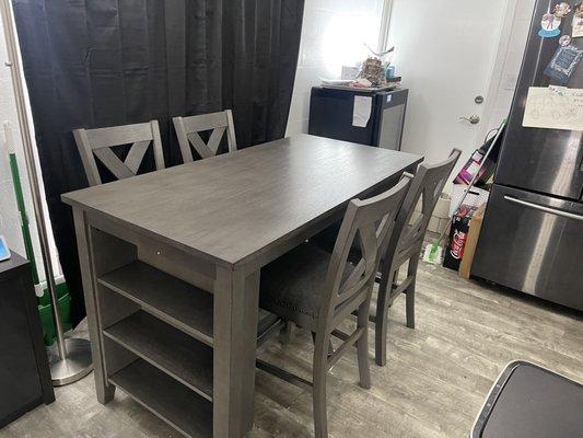 Caitbrook Table and Caitbrook bar chairs