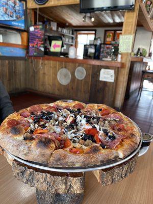 Pizza was served on tree stump!!!