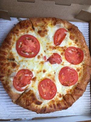 My own pizza, garlic butter sauce only,  with garlic buttery crust and mozzarella topped with tomatoes.   Can you say Awesome!