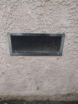 A vent we replaced to keep rats out