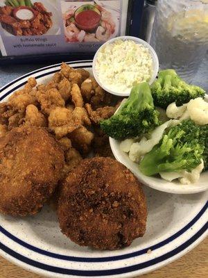 2 crab cakes, fried shrimp, steamed vegetables, with Cole slaw