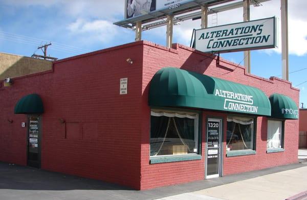 Alterations Connection store front.  We are the bright red building with green awnings across the street from Statewide Lighting