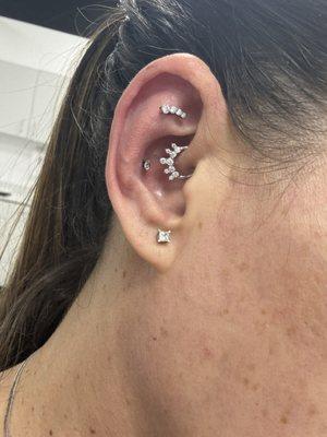 New jewelry for flat and daith. New conch piercing by Mel.