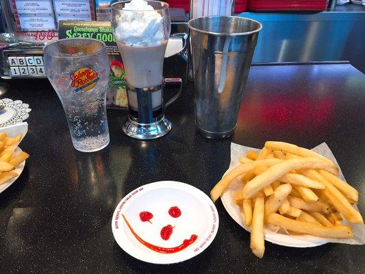 Fries and chocolate shake... love the little ketchup-smile they give you! :)