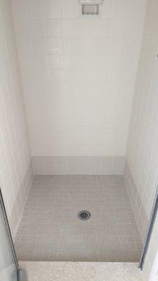 Shower, After photo 2: The cracks and missing grout lines are all filled perfectly.