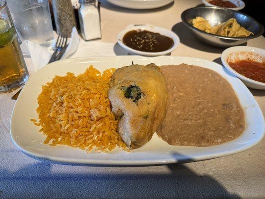 Brisket Chili Relleno with refried beans & rice