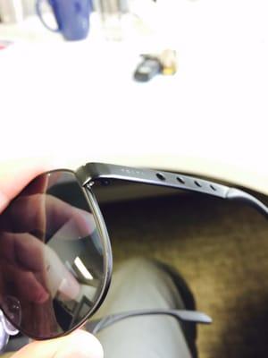 Frame is scratched at the bottom right. Make sure you inspect the lenses and frames when you order from here.