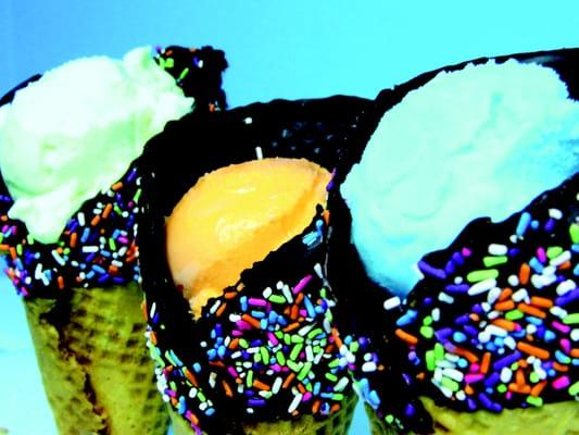 Try a scoop of smooth and creamy sherbet in our hand rolled waffle cones dipped in dark chocolate and sprinkles!