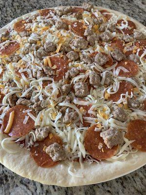 Pepperoni and sausage pizza