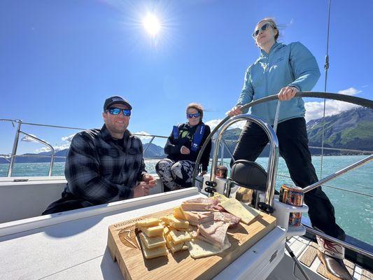 Wife at the helm, me eating the charcuterie